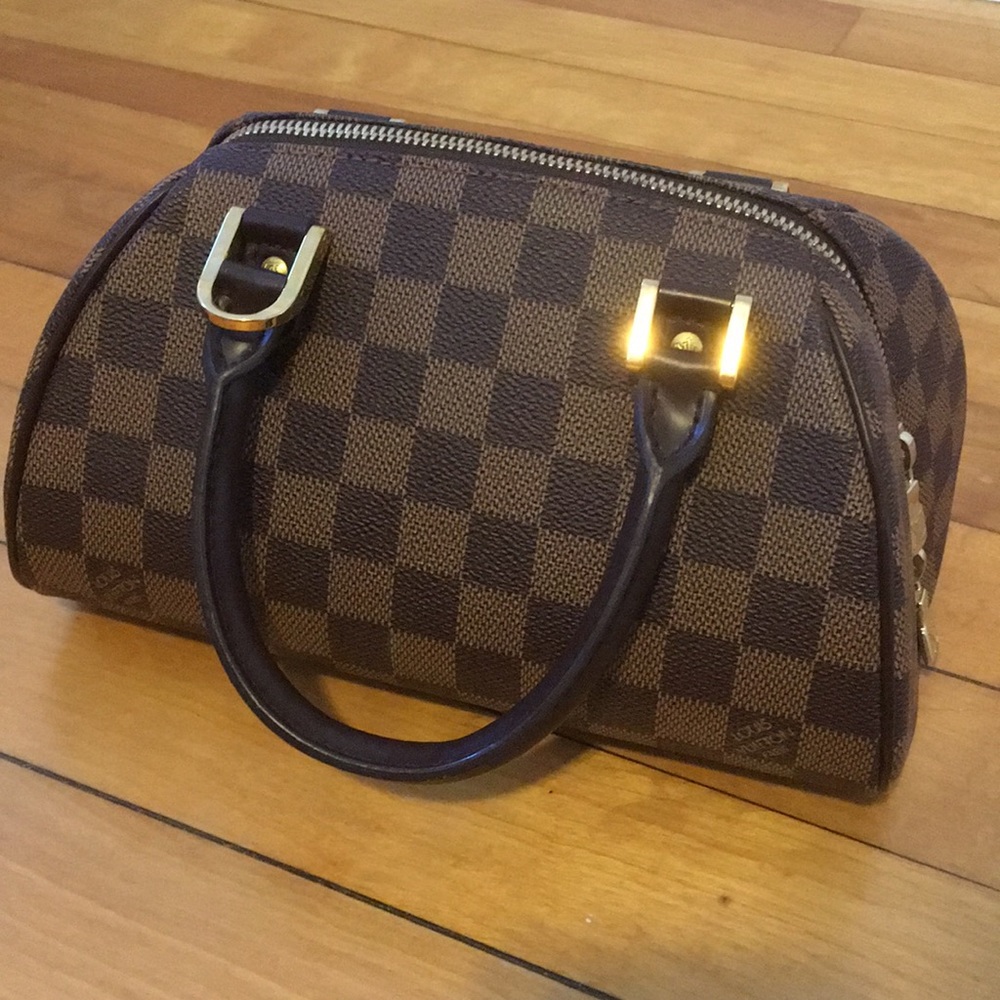 Authentic Louis Vuitton Rivera Purse